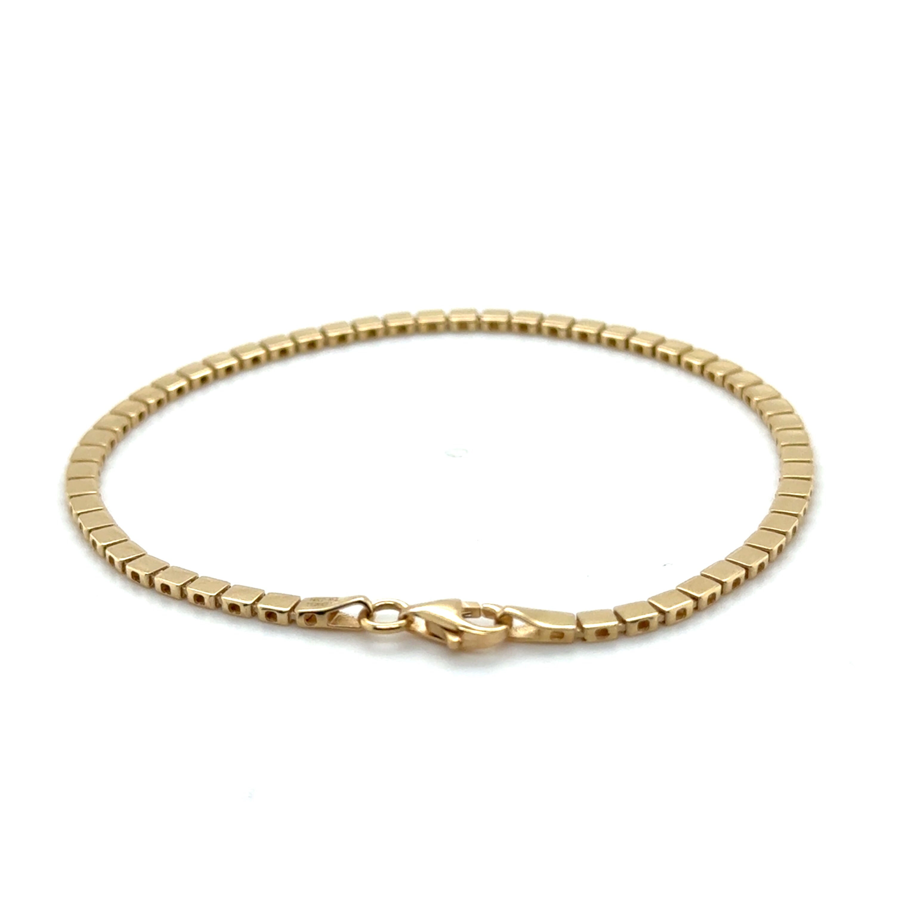 A timeless and elegant gold chain bracelet with box links, perfect for everyday wear or special occasions. This durable and versatile bracelet is a stylish gift idea for birthdays, anniversaries, or milestone celebrations.